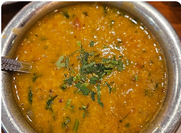 Slow-cooked dal in a kadhai