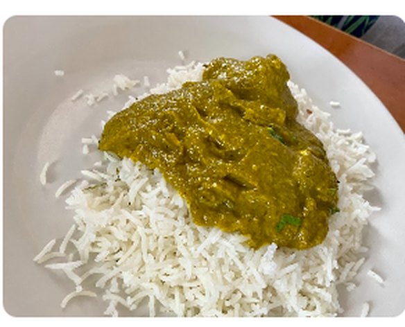 Palak paneer over basmati rice